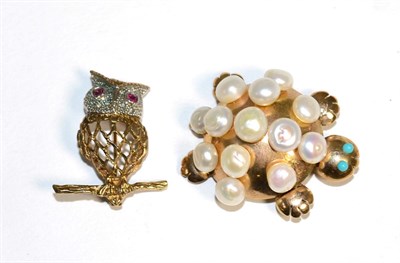 Lot 194 - A 9 carat gold ruby and diamond owl brooch, with ruby set eyes, pavé set diamond head and...
