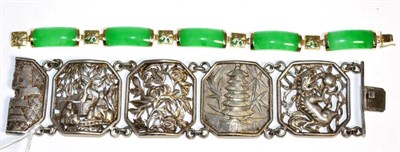 Lot 195 - A jade bracelet, curved oblong jade links spaced by dragon motif square links on jade backs, length