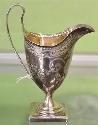 Lot 207 - A George III silver cream jug