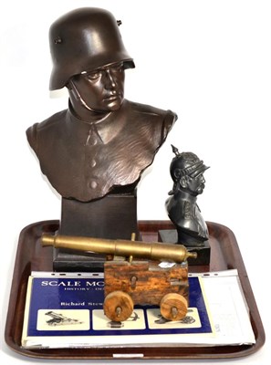 Lot 213 - A plaster bust of First World War soldier; a model canon; and a metal bust (3)