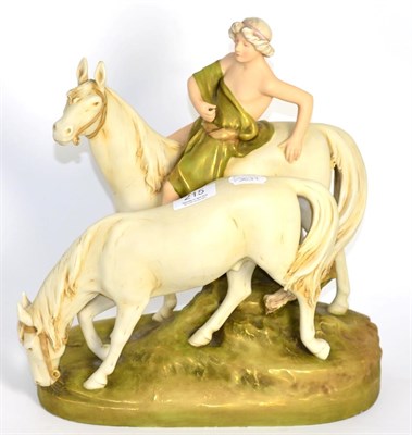 Lot 215 - A Royal Dux figural group, modelled as a Classical figure on a horse