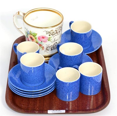 Lot 222 - Six Moorcroft powder blue cups and saucers and a 19th century mug inscribed ";Jane Bassett"