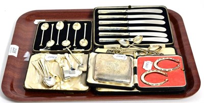 Lot 228 - A group of silver including horseshoe form napkin rings, teaspoons, cigarette case etc