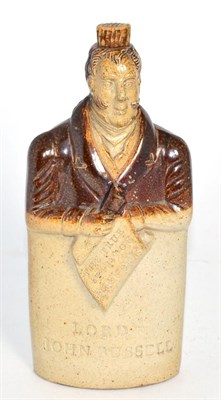 Lot 259 - A stoneware flask in the form of Lord John Russell by Bournes Potteries Derbyshire