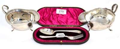 Lot 270 - A Georgian style silver sauceboat, T & S, Sheffield, 1935; another S. Ltd, Birmingham, 1965; with a