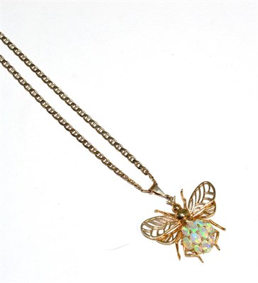 Lot 295 - An opal bee pentant, with pierced wings and an oval cut opal set body, measures 3.5cm by 4cm,...