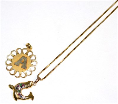 Lot 296 - A 9 carat gold multi-gemstone and diamond novelty seal pendant, measures 3cm by 1cm, on a box...