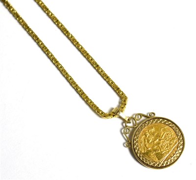 Lot 299 - An Elizabeth II 1982 half sovereign, loose mount in a 9 carat gold frame as a pendant, on a 9 carat