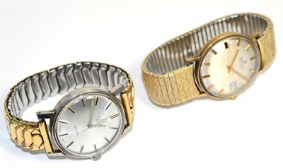 Lot 323 - A 9 carat gold wristwatch signed Marvin Revue and a stainless steel wristwatch, signed Tissot,...