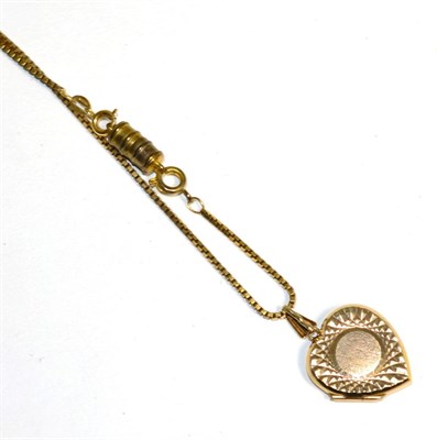 Lot 330 - A 9 carat gold locket pendant on a 9 carat gold box link chain, length 46.5cm