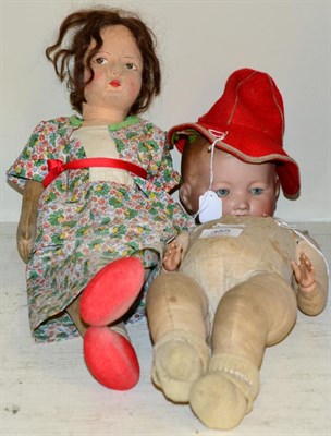 Lot 355 - Circa 1930s Lenci type doll with felt body, wearing a floral dress, red felt shoes and matching...