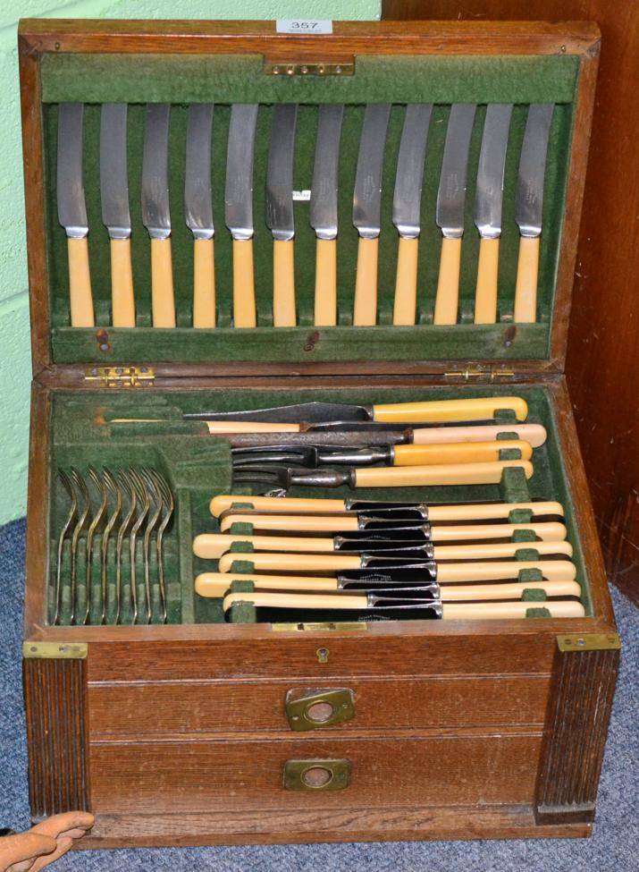 Lot 357 - An oak canteen of plated flatware