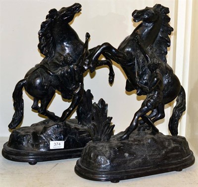 Lot 374 - A pair of spelter Marley horses