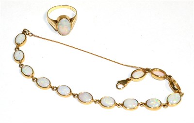 Lot 389 - A 9 carat gold opal bracelet, oval cabochon opals in rubbed over settings as individual links,...