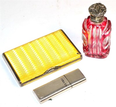 Lot 421 - A silver and yellow enamelled lady's cigarette case with import marks, a silver lighter and a...