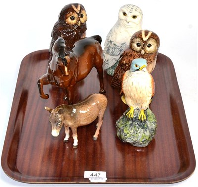 Lot 447 - A Beswick horse, a Beswick donkey and four Royal Doulton Scotch Whisky ceramic birds including...