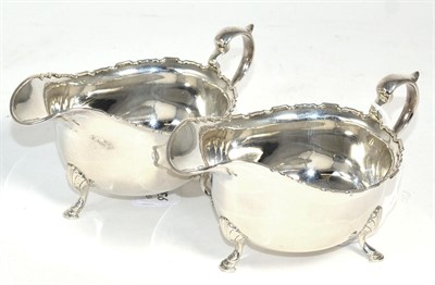 Lot 474 - A pair of silver sauceboats by Hamilton & Inches