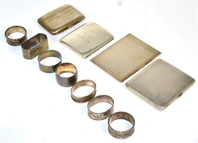 Lot 480 - Four silver cigarette cases and six various silver napkin rings