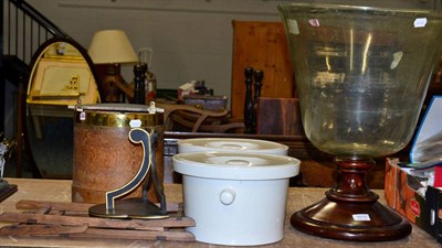 Lot 1010 - A large Victorian glass vessel with turned mahogany foot, together with two wooden stands, a...