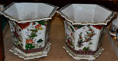 Lot 1016 - A pair of Chinese porcelain jardinieres on stands