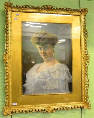 Lot 1167 - A pastel of a young women