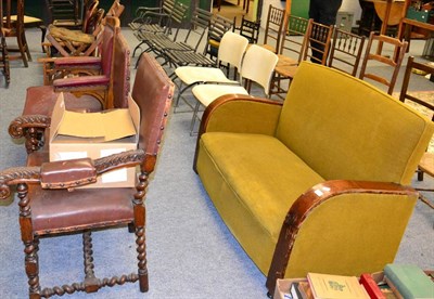 Lot 1174 - A 1930's two seater sofa, a pair of chrome and cream painted metal chairs, three 1920's oak chairs