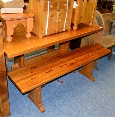 Lot 1189 - Beaverman: A Colin Almack pine refectory table, on two shaped supports joined by a stretcher,...