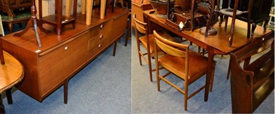 Lot 1198 - A Mackintosh 1960s teak dining suite comprising a sideboard fitted with three central drawers...