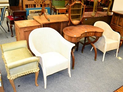 Lot 1201 - Two Lloyd Loom white painted wicker chairs, a reniform mahogany dressing table and a stool (4)