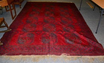 Lot 1214 - Turkmen carpet, North Afghanistan, the blood red field of 'elephant foot' güls enclosed by stepped