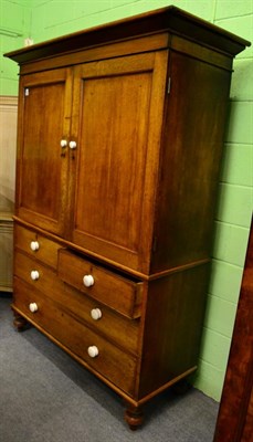 Lot 1246 - A George III oak linen press cupboard