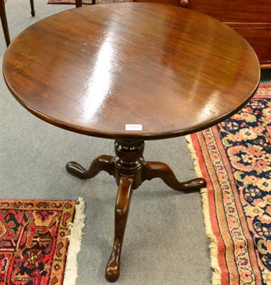 Lot 1267 - A mahogany bird cage tripod table