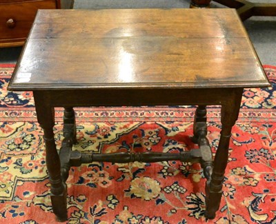 Lot 1268 - An 18th century oak side table