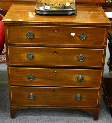 Lot 1274 - A Regency mahogany chest of drawers, the cross banded top with boxwood stringing