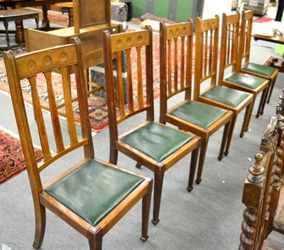 Lot 1276 - A set of six oak dining chairs with registration number stamp under seat