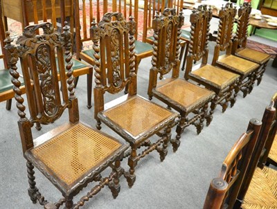 Lot 1277 - A set of six 19th century oak dining chairs with caned seats