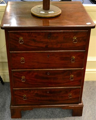 Lot 1286 - A George III mahogany four height chest of drawers of small proportions