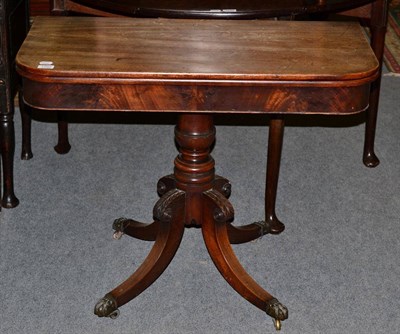 Lot 1292 - A 19th century mahogany fold over tea table