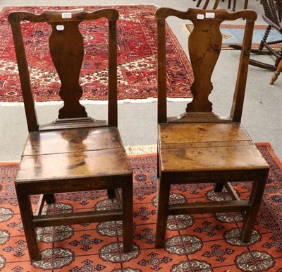 Lot 1293 - A pair of 18th century oak dining chairs, urn shaped splats, solid seats (2)