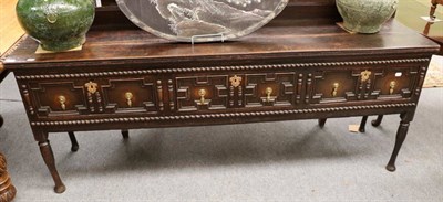 Lot 1298 - An 18th century carved oak dresser base