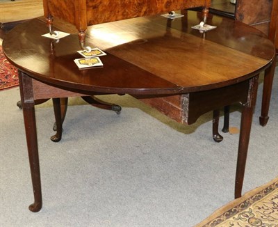 Lot 1299 - A 19th century mahogany gateleg table