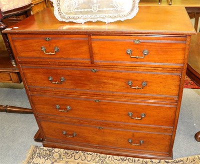 Lot 1307 - A mahogany five height chest of drawers by Trollope London