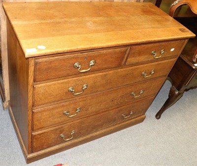 Lot 1309 - An oak four height chest of drawers