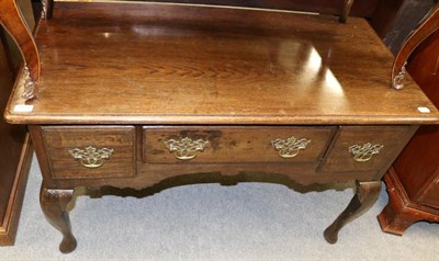 Lot 1311 - A 19th century oak lowboy