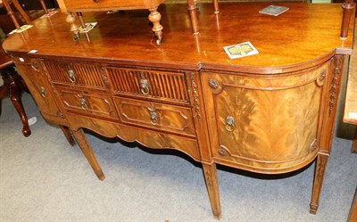 Lot 1316 - A Georgian style mahogany sideboard