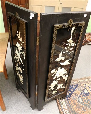 Lot 1322 - A Chinese ebonised two fold mother of pearl inlaid screen