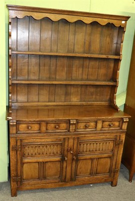 Lot 1333 - A Titchmarsh & Goodwin design oak dresser and rack