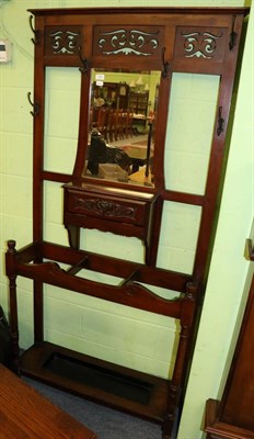 Lot 1335 - An Edwardian mahogany hall stand