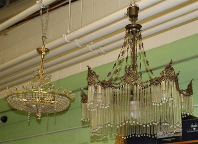 Lot 1337 - A pendant drop light fitting together with a glass bead and gilt metal light fitting (2)