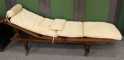 Lot 1340 - A 19th century mahogany and cane work campaign day bed